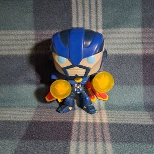 Superhero Action Figure with Blue and Yellow Accents